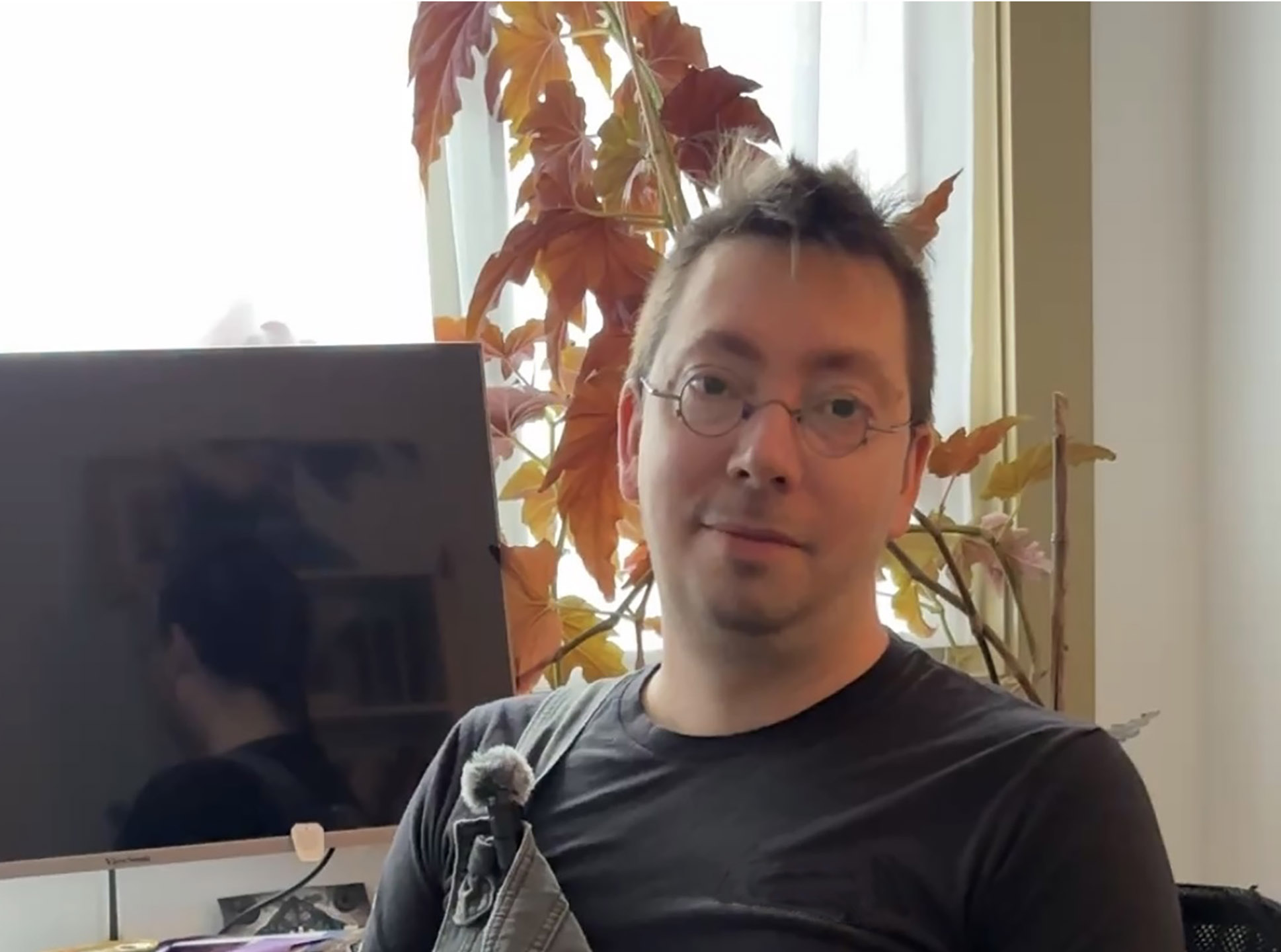 Screenshot White Bird crisis line staff member at his desk